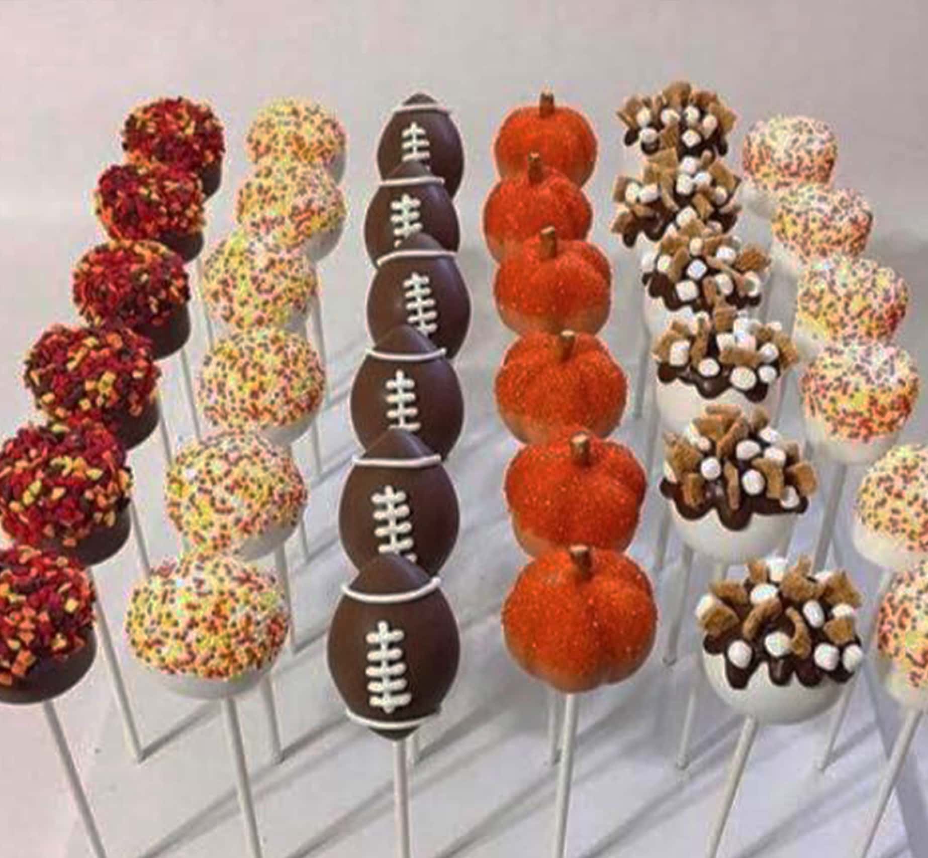 sports cake pops by dickerson's bakery